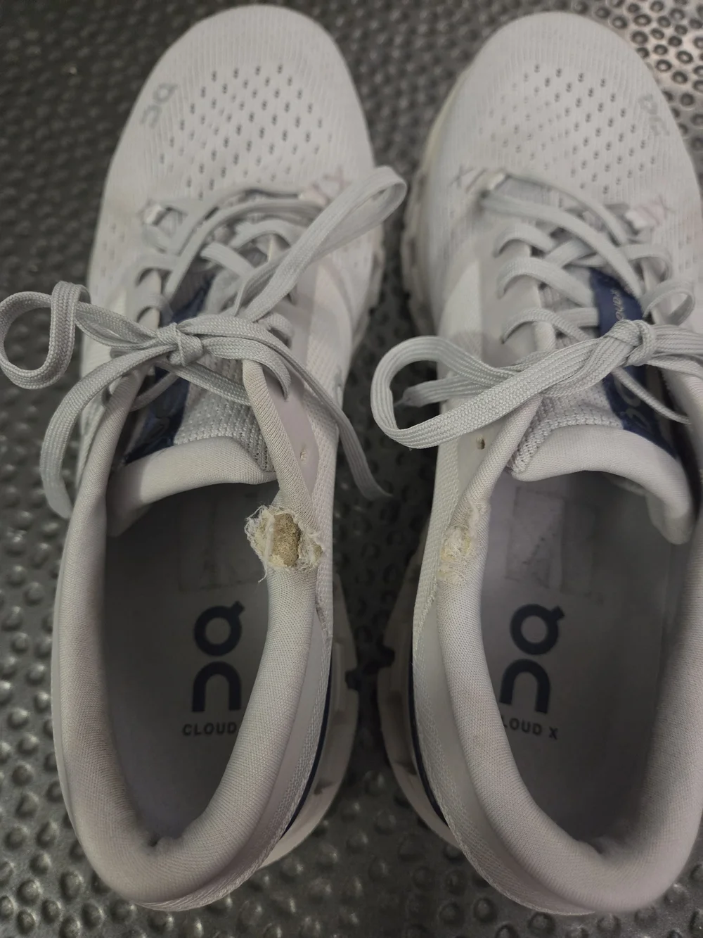On Running Sneakers in Light Gray with Navy Tongue Accents